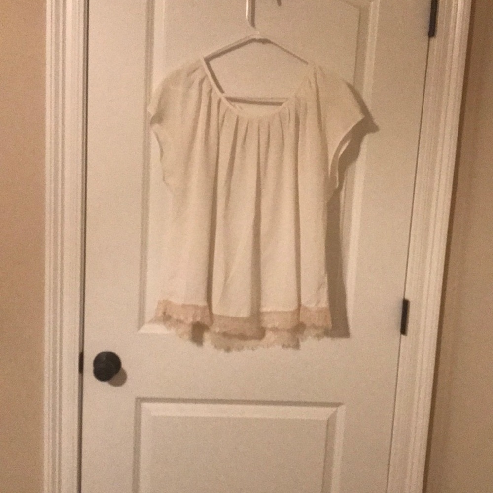 Cream blouse with lace trim